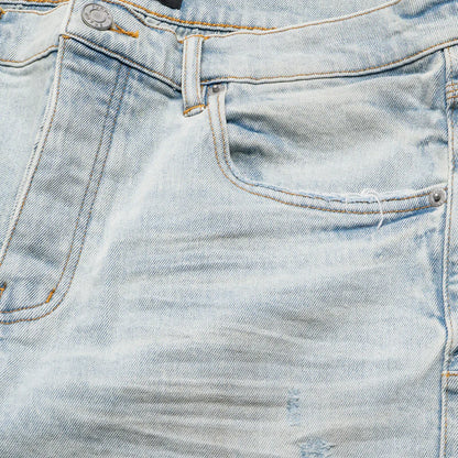 PURPLE BRAND LOW RISE SKINNY LEG FADE DISTRESSED JEAN